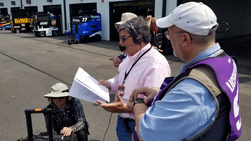 Jeremy, Chris and Kevin going over the script